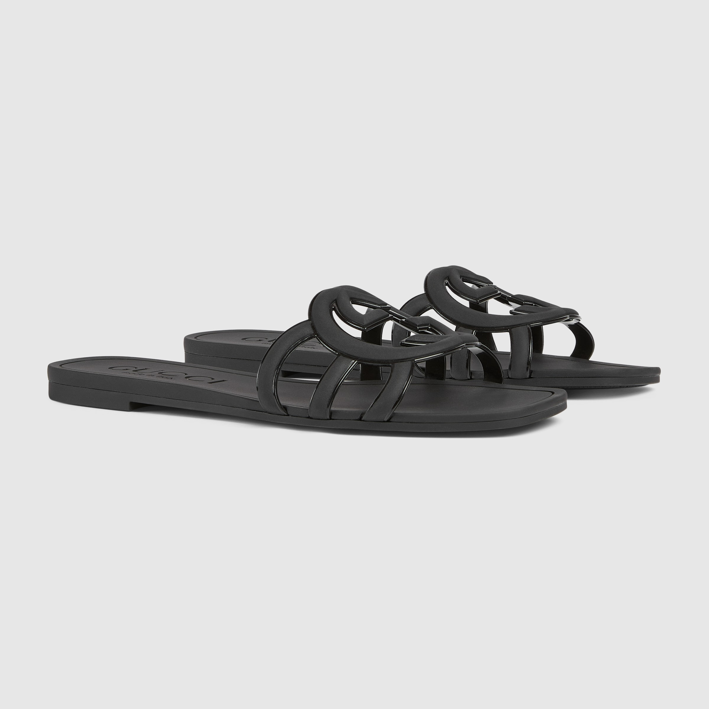 Women's Interlocking G slide sandal in black rubber GUCCI® US