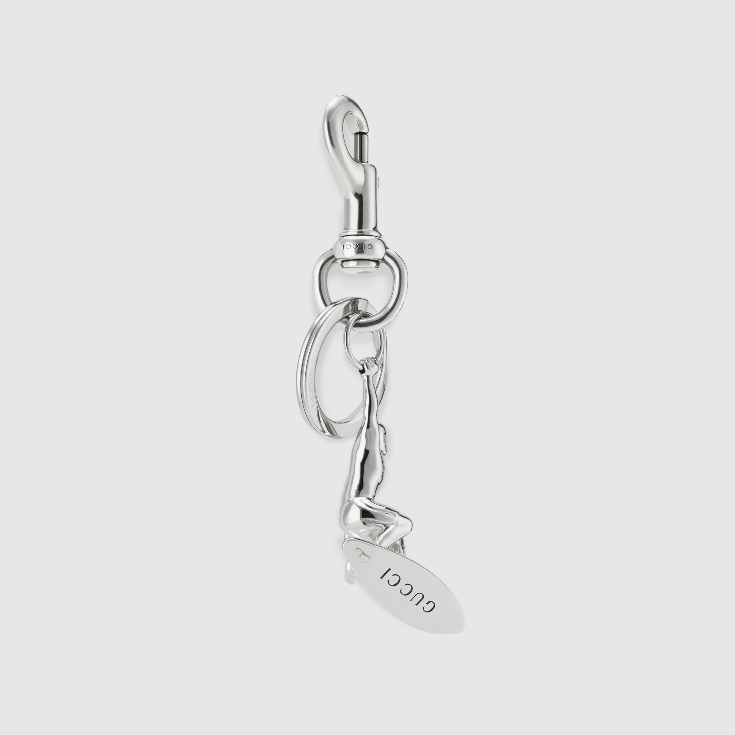 Engraved surfer keychain charm in silver-toned metal | GUCCI® US