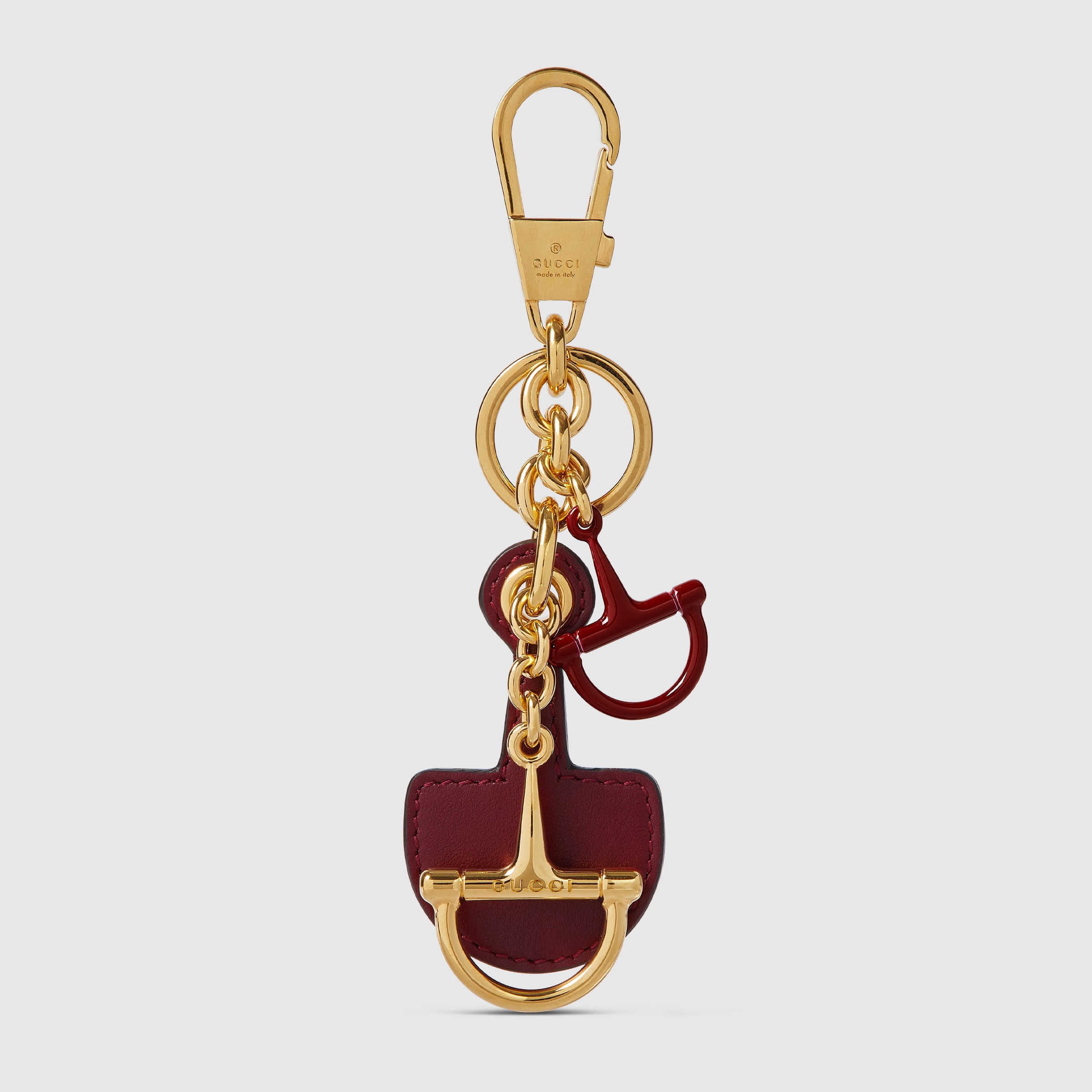 Half-Horsebit shaped keychain in Rosso Ancora red leather | GUCCI® US