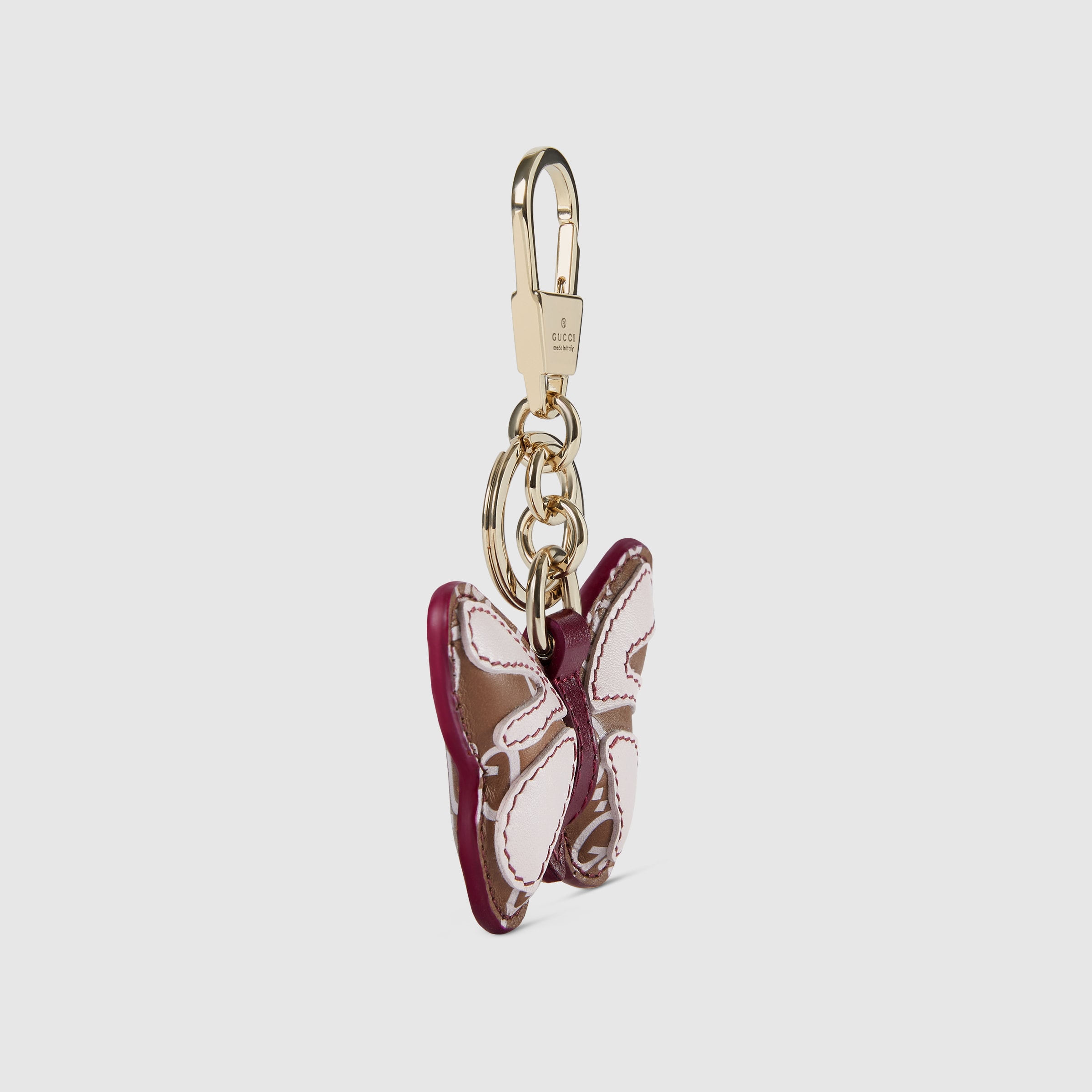 Butterfly-shaped keychain in brown and pink GG leather