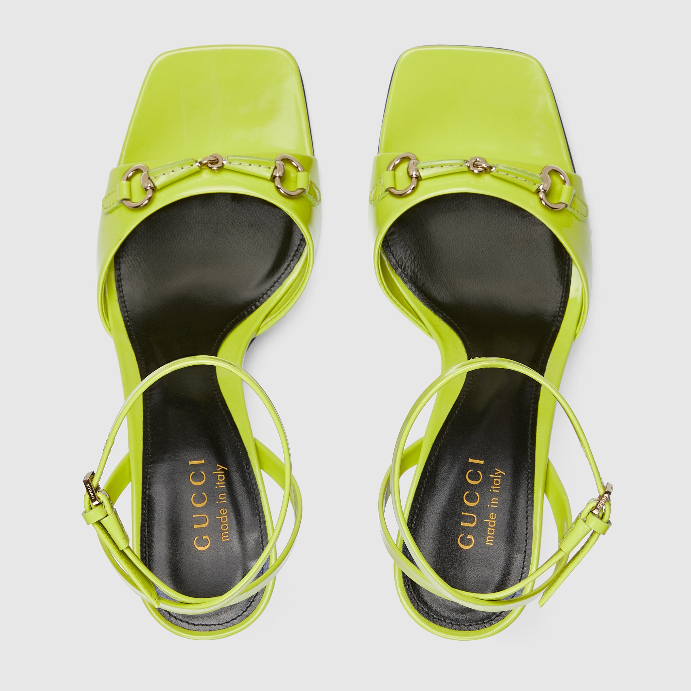 Women's sandal with Horsebit in acid green shiny leather