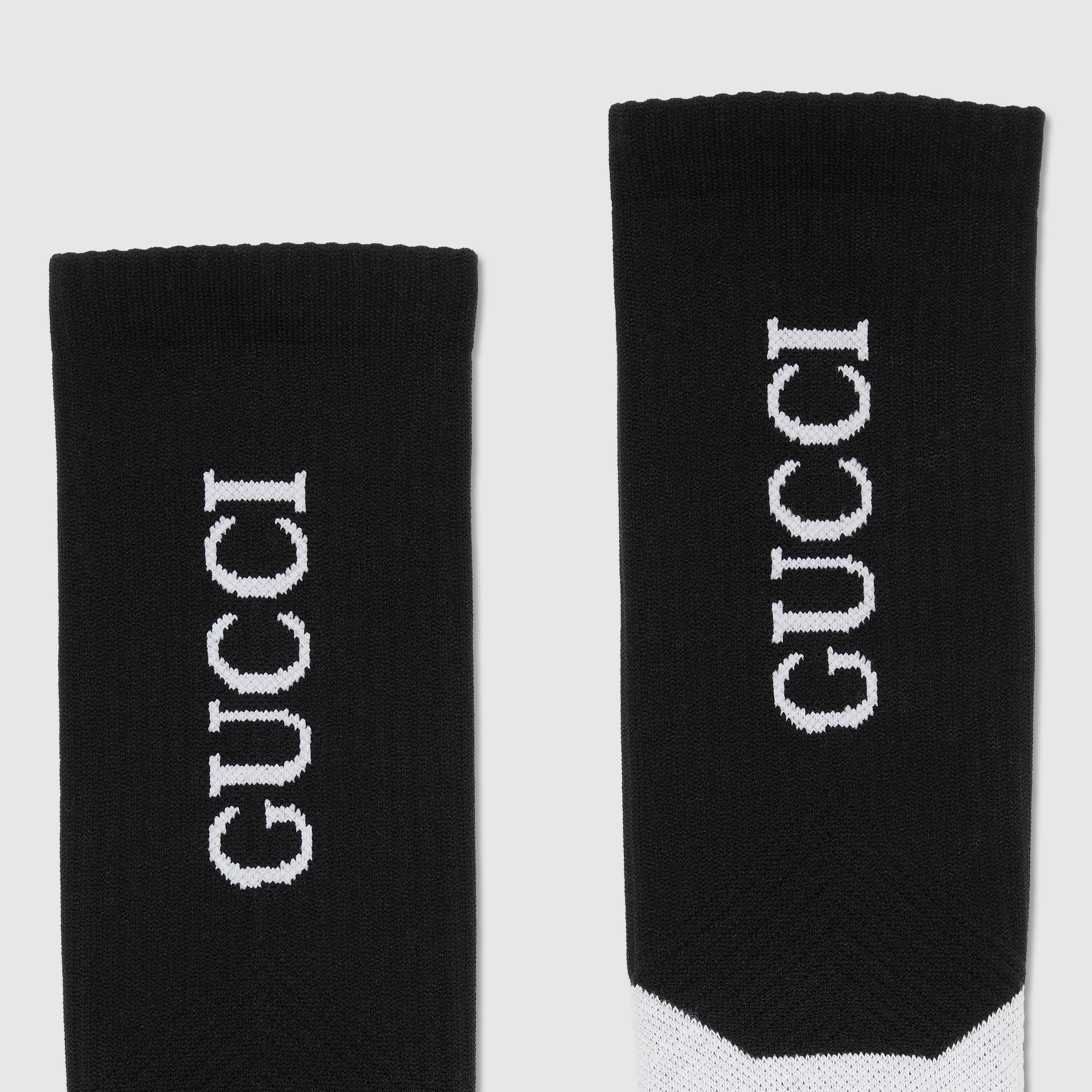 Cotton socks with embroidery in black and white | GUCCI® US