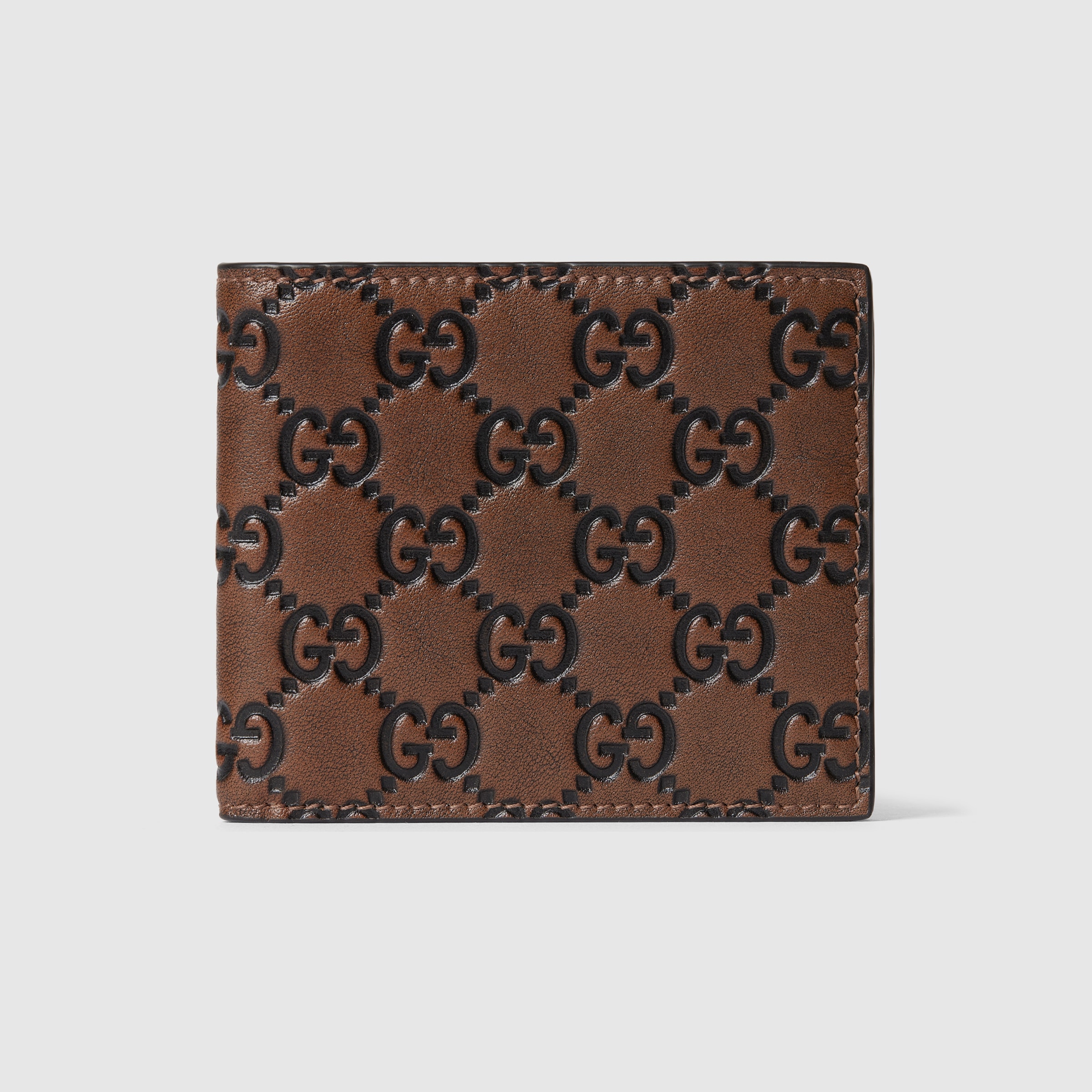 GG Emblem bi-fold wallet in brown and black GG leather | GUCCI® US