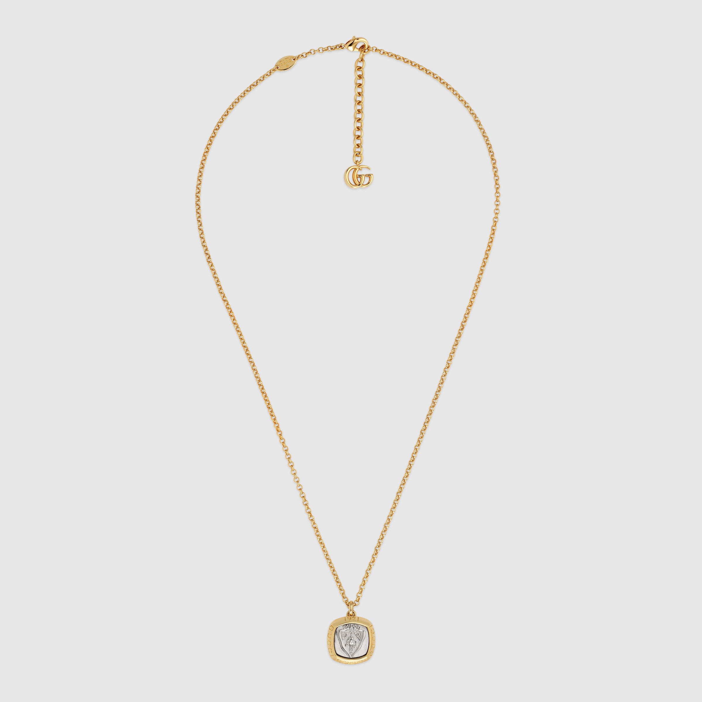 Gucci crest pendant necklace in gold-toned brass | GUCCI® GR
