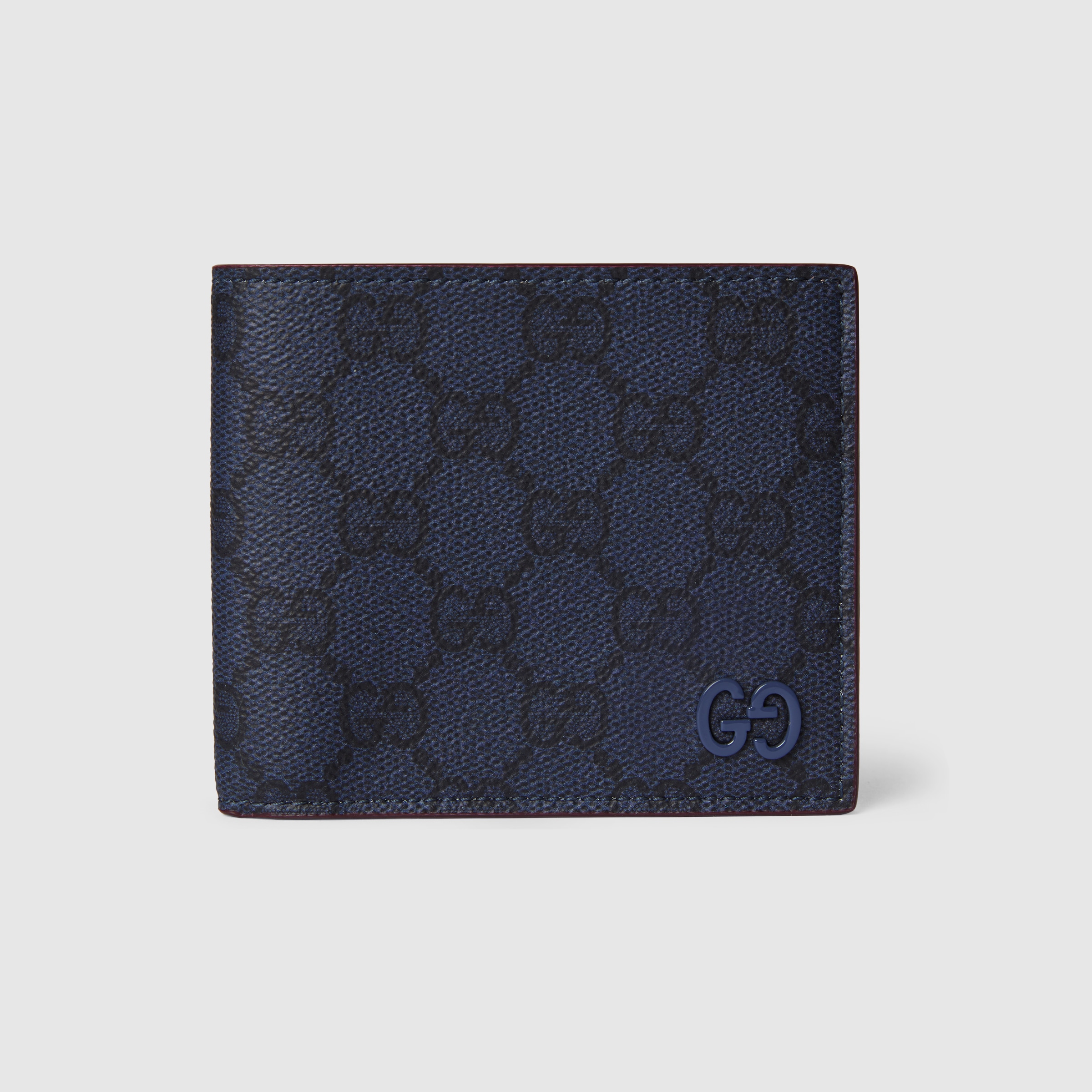Bordeaux interior GG bi-fold wallet in dark blue GG Supreme