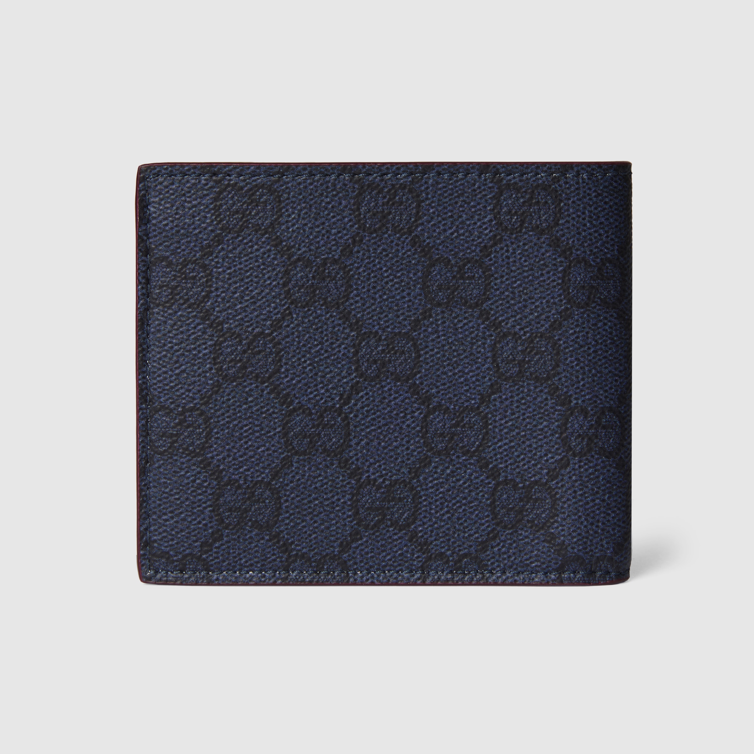 Bordeaux interior GG bi-fold wallet in dark blue GG Supreme