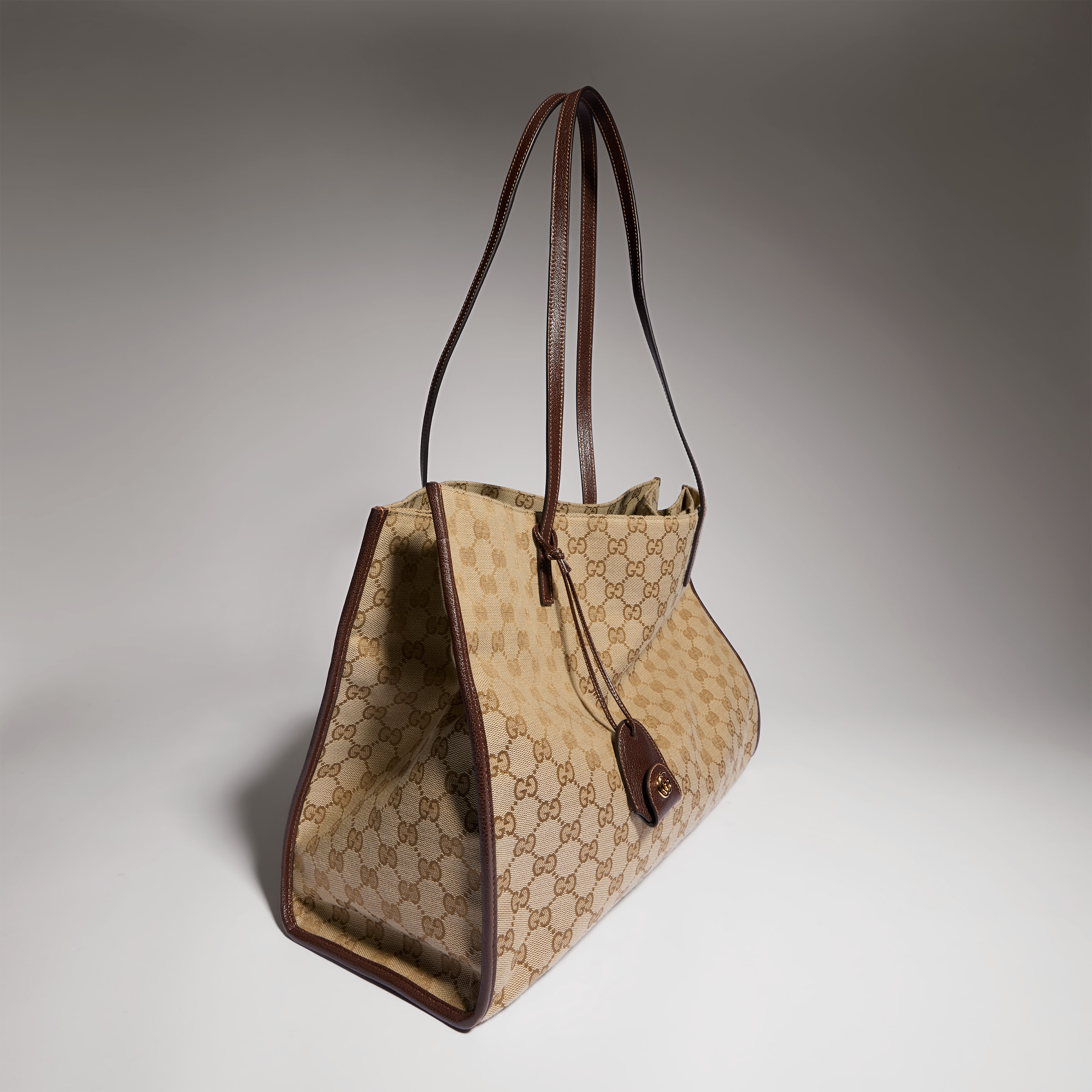 Gucci Londra large tote bag in sand and brown GG canvas | GUCCI® US