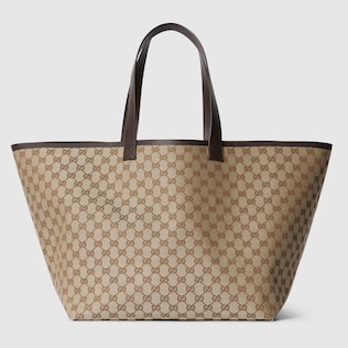 Gucci logo supreme canvas tote hotsell