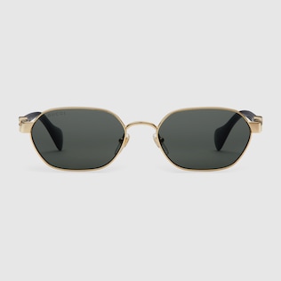 Round frame sunglasses in black acetate GUCCI US