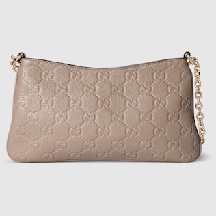 GG Emblem medium shoulder bag in beige and white fabric