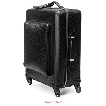 black gucci luggage