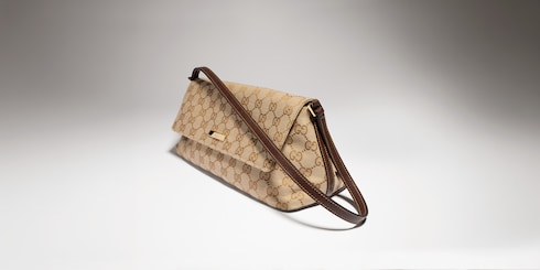 Bolso de hombro mediano con placa Gucci