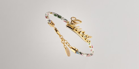 Bracciale in pelle con scritta Gucci