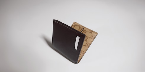 Coin wallet with metal tag