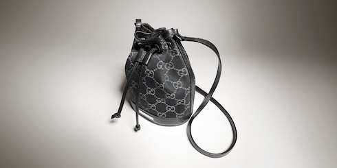 Mini bucket bag with Gucci plaque