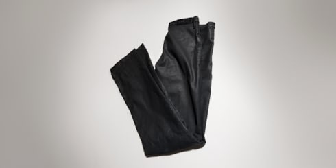Pantaloni in denim di cotone stretch spalmato