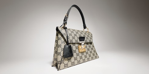 Bolso de mano pequeño con asa y cerradura