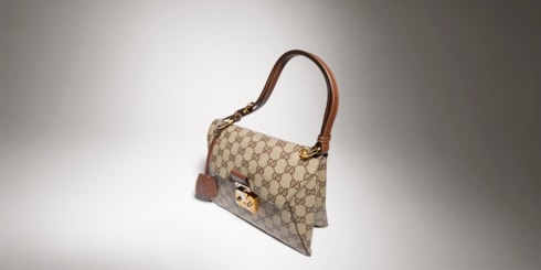 Small top handle bag with lock