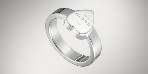 Trademark ring with heart pendant