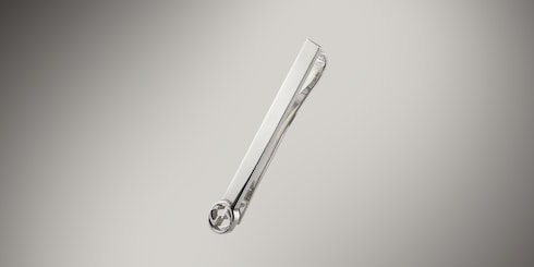 Tie bar with Interlocking G