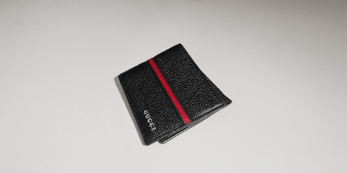 Cartera con dos pliegues y tribanda Web