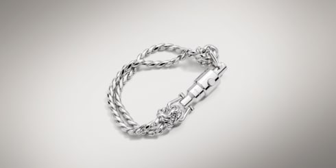 Bracciale a catena con chiusura a pistone