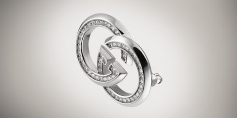 Broche avec détail GG enlacés et cristaux