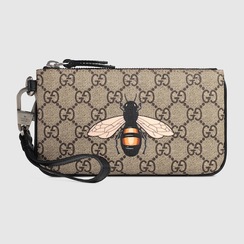gucci bee print gg supreme pouch