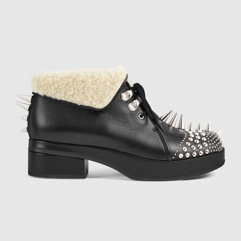 gucci leather bootie with studs