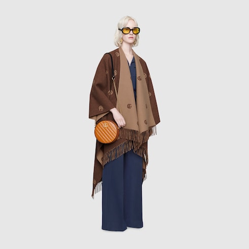 Reversible cape with Double G pattern