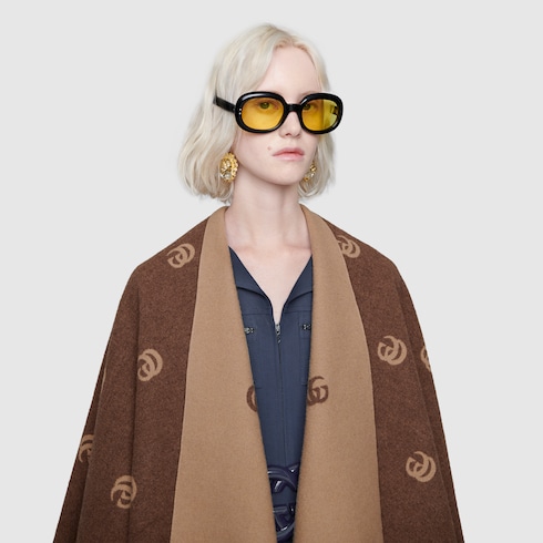 Reversible cape with Double G pattern