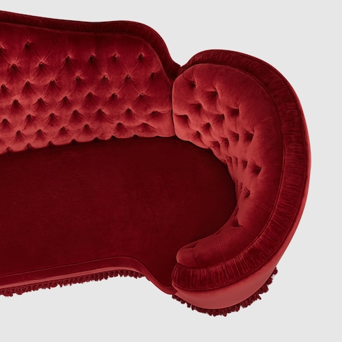 Canapé capitonné style chippendale