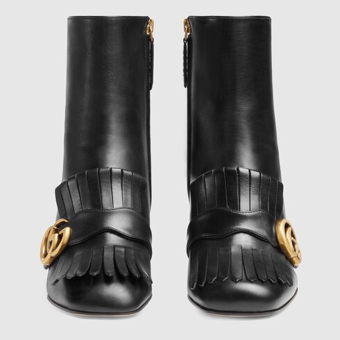 quilted leather ankle boot with belt
