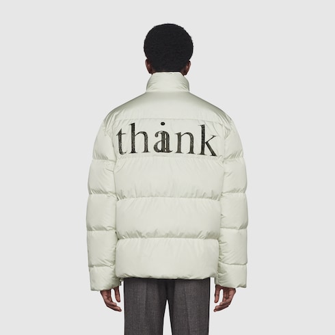 Gucci 'think/thank' print nylon down jacket. 5