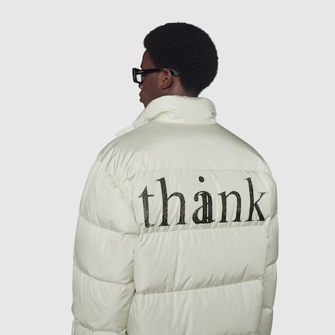 Gucci 'think/thank' print nylon down jacket. 6