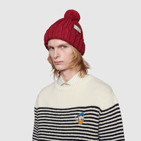 Knit wool hat with Gucci label in bright red | GUCCIÂ® TR