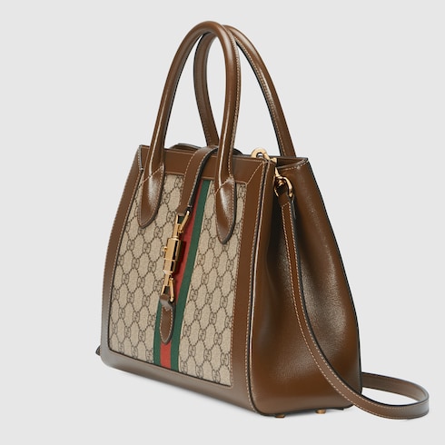 Medium tote bag with piston closure