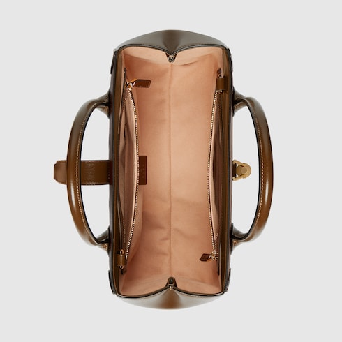 Medium tote bag with piston closure