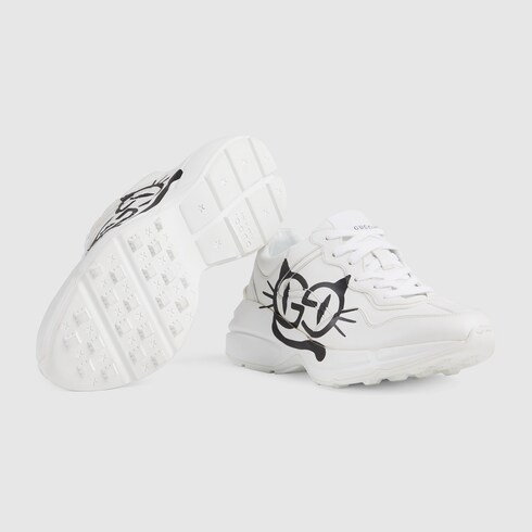 Gucci Women's Rhyton sneaker with cat eyes. 8