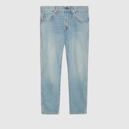 Pantalone attillato in denim in blu | GUCCI® Italia