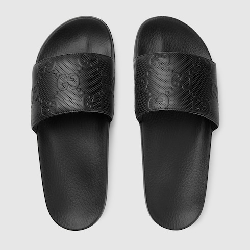 Gucci rubber 2025 gg slides black