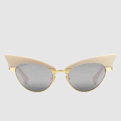 Gucci Cat-eye sunglasses with interchangeable frame. 8