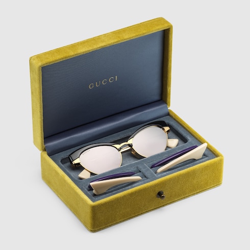 Gucci Cat-eye sunglasses with interchangeable frame. 12