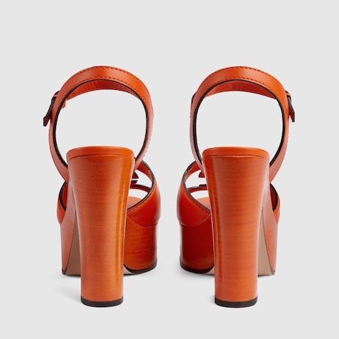Women's Interlocking G sandal in orange leather | GUCCI® SG