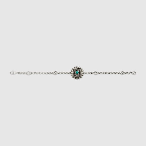 Interlocking G bracelet with flower in 925 sterling silver | GUCCI® SG