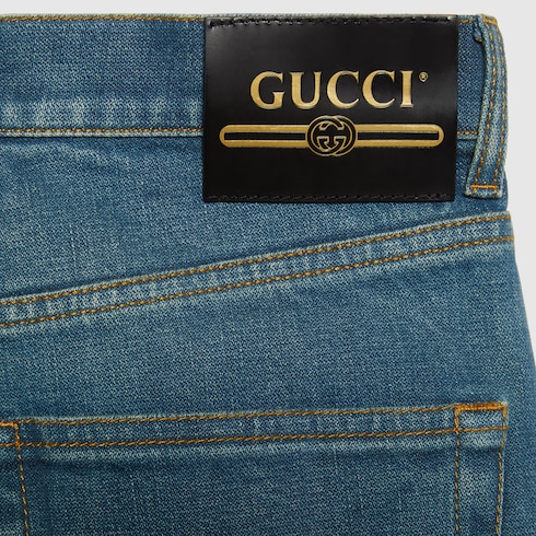 GUCCI ラベル付き デニム フレアパンツダークブルー | GUCCI® JP