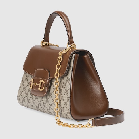 Sac a main Gucci Horsebit 1955 taille moyenne en toile GG Supreme beige et ebene GUCCI BE