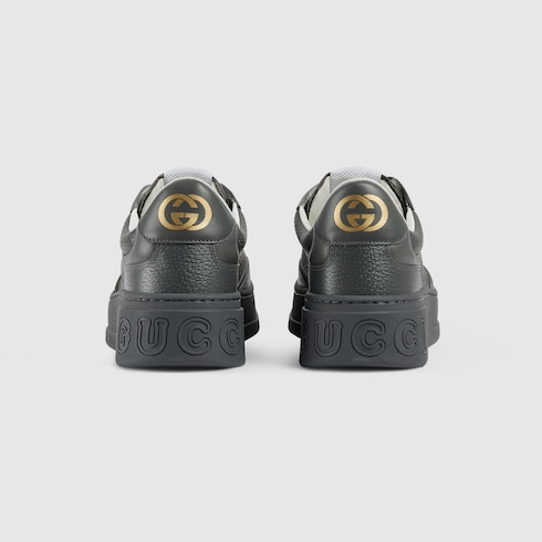 Gold gucci tennis shoes top