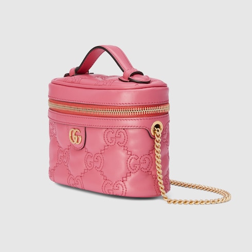 GG Matelassé top handle mini bag