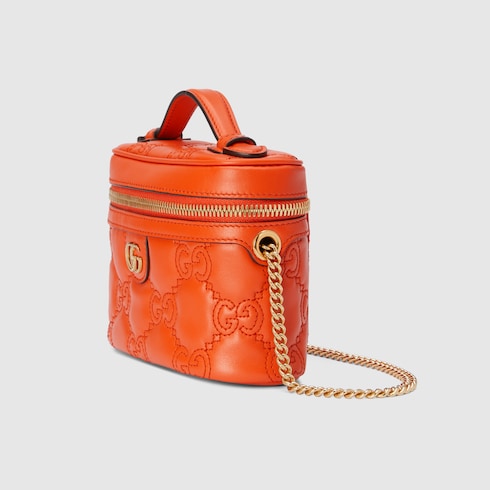 GG Matelassé top handle mini bag